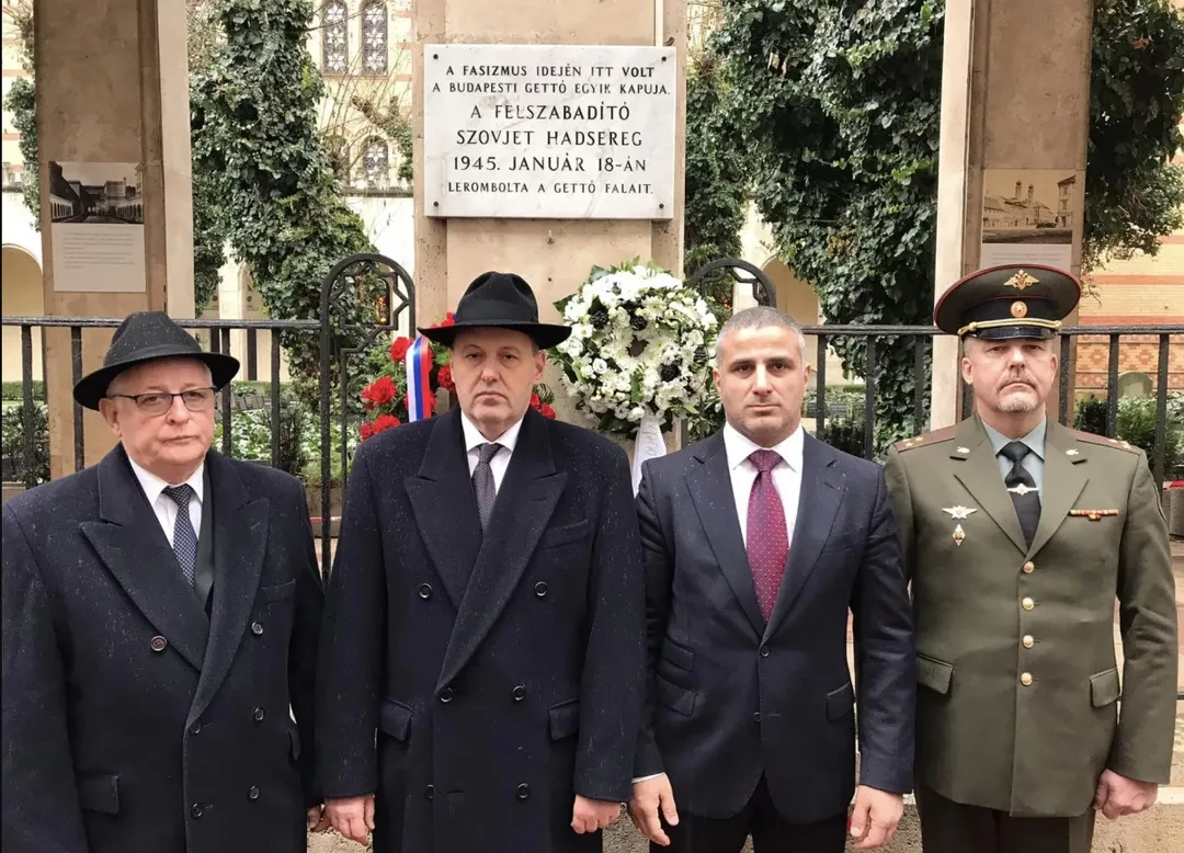 Colonel Oleg Smirnov (in the green military uniform on the far right)